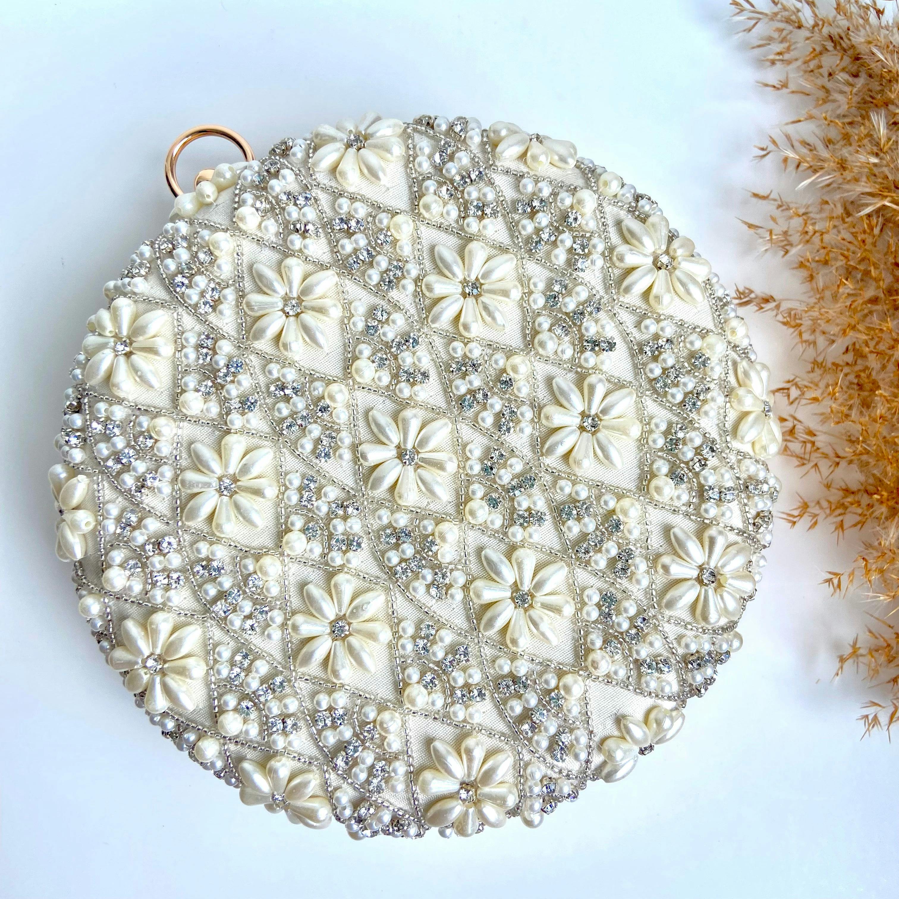 ALIA Pearl round clutch, a product by Clutcheeet