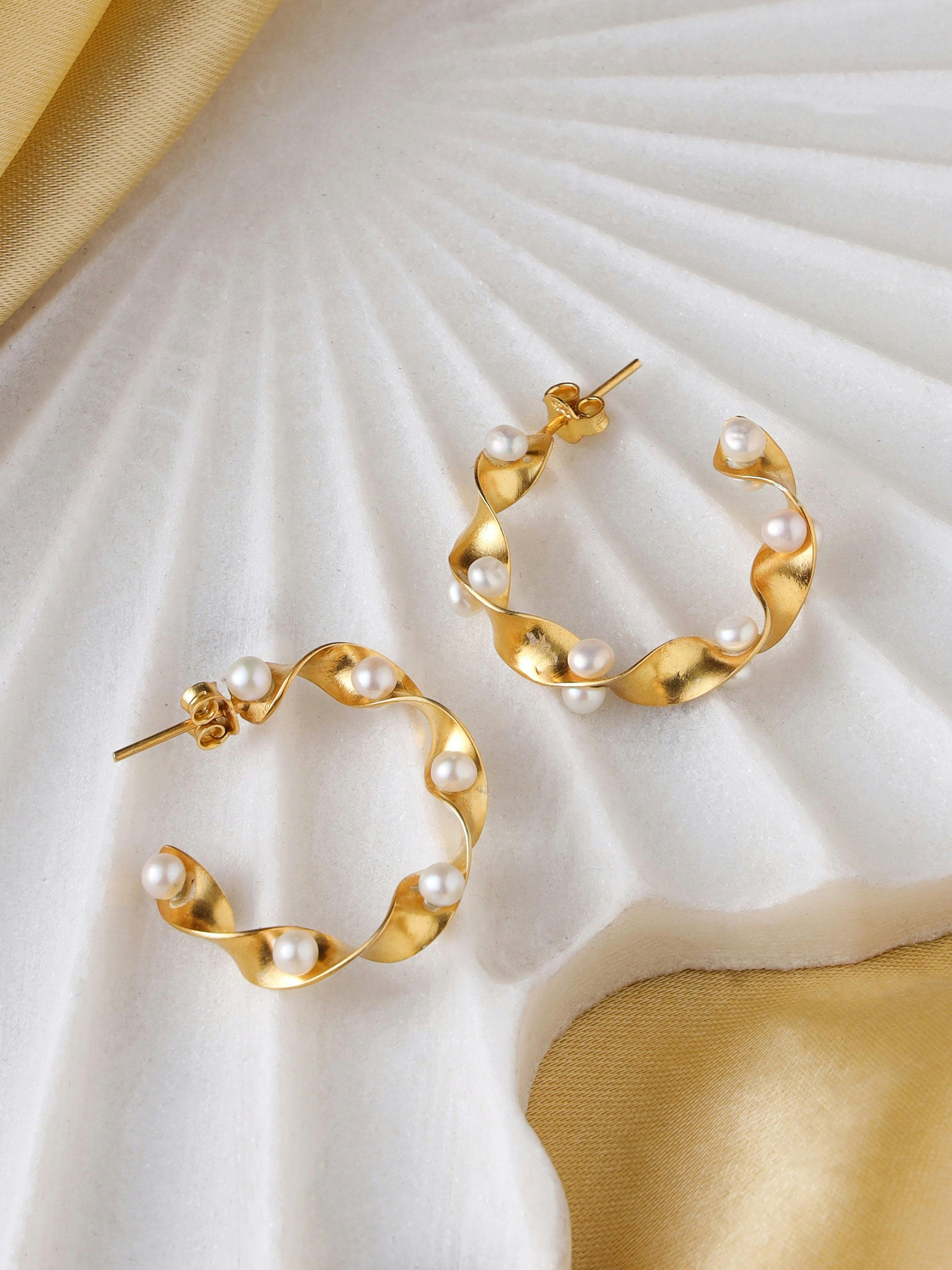 Pearl spiral hoops, a product by The Jewel Closet Store