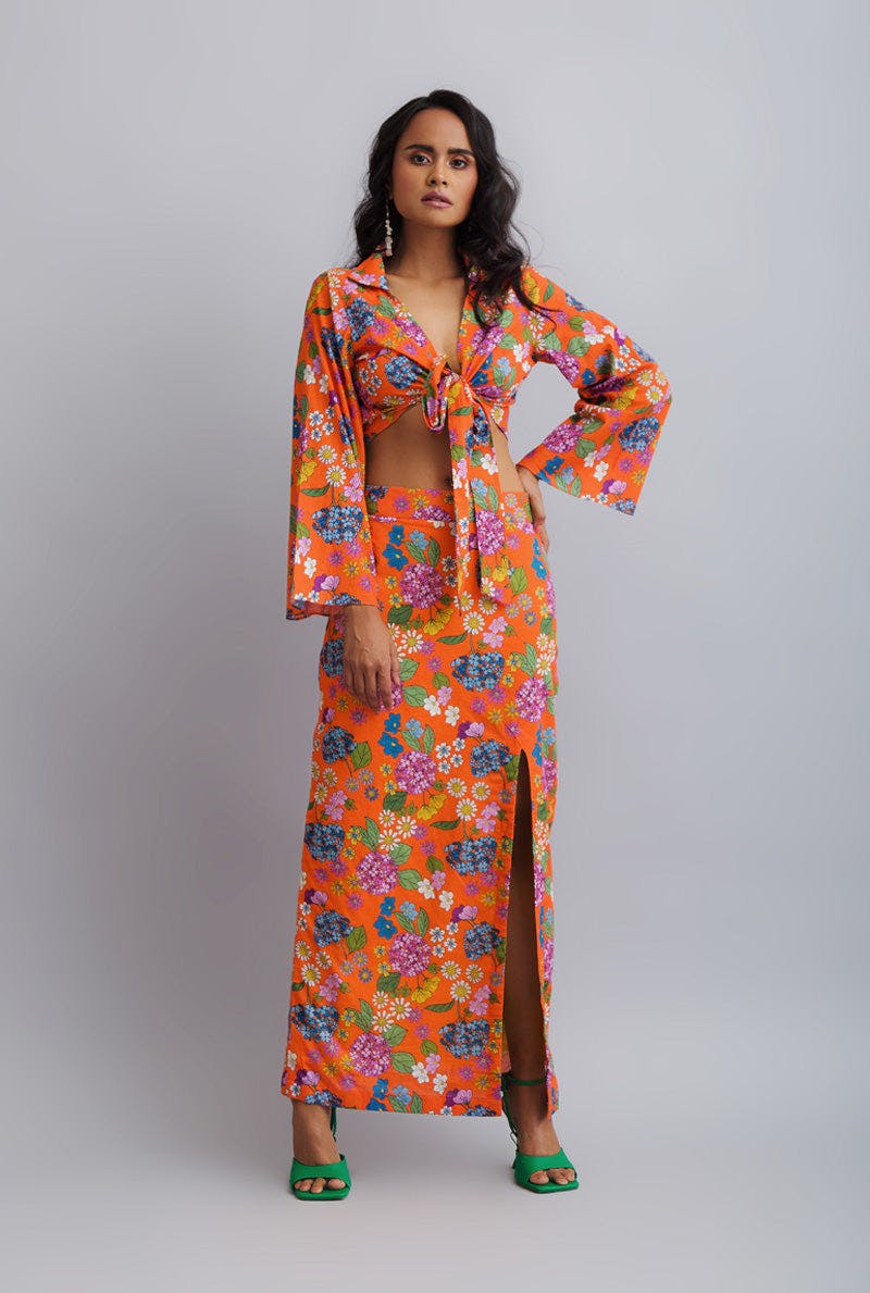 Printed Bell Sleeve Tie Up Top With Slitted Skirt , a product by Nautanky