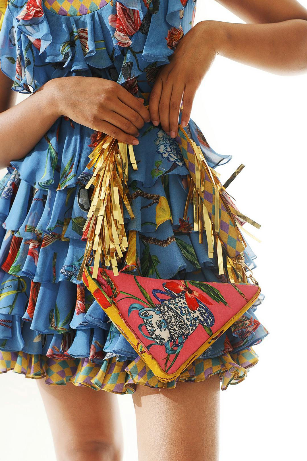 Thumbnail preview #0 for Triangle floral print bag with golden tassels handle
