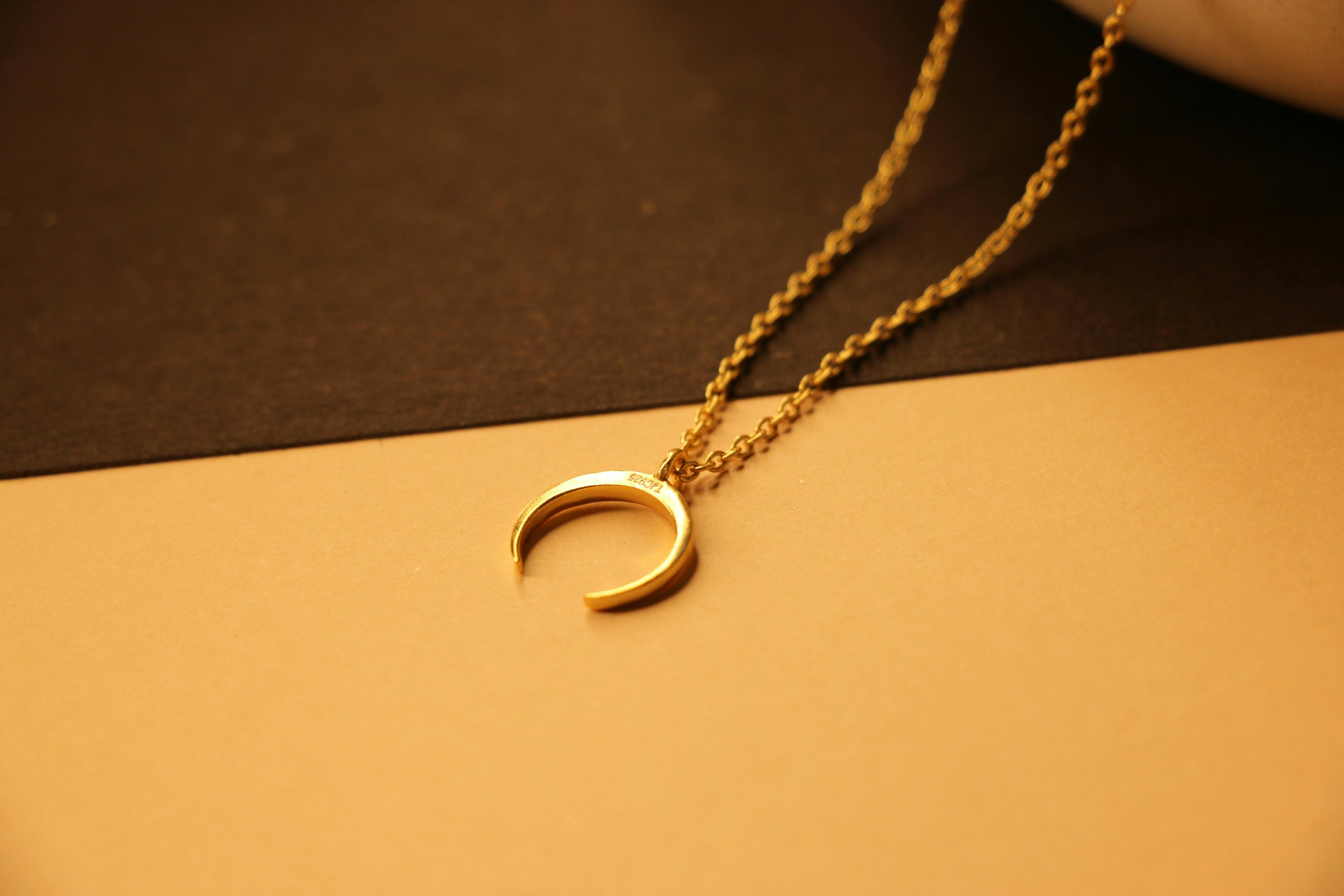 Moon shaped necklace, a product by The Jewel Closet Store