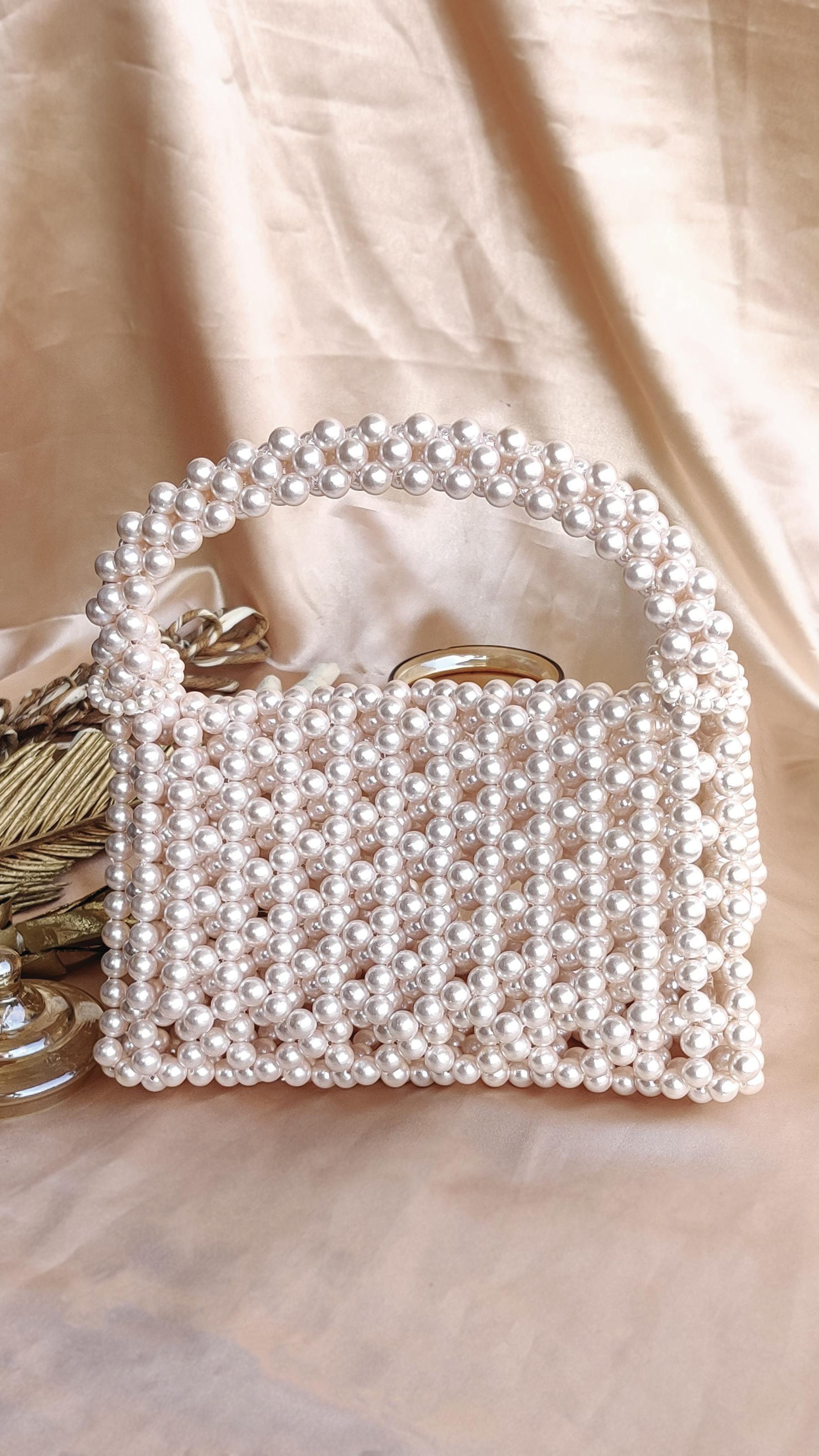 The Triangle Pearl Bag, a product by Clutcheeet