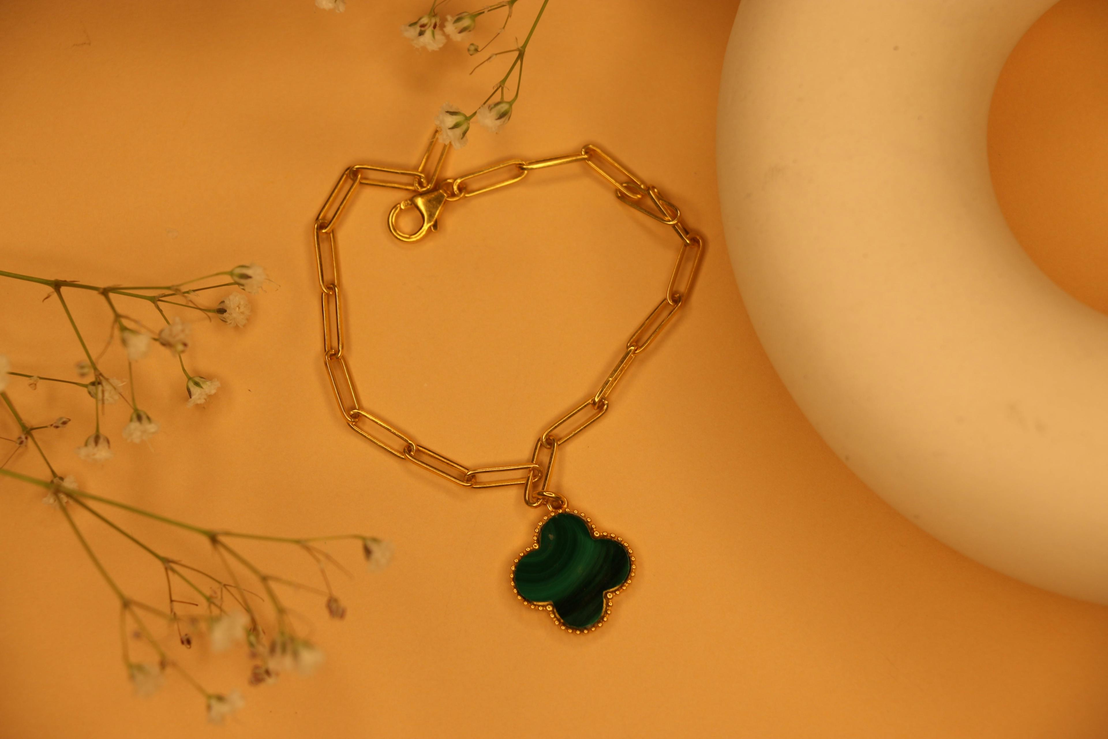 Malachite clover clip bracelet, a product by The Jewel Closet Store