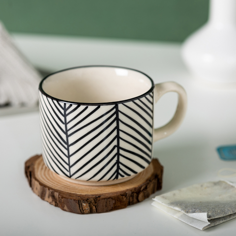 Black Stripes White Color Ceramic Tea Cup with Design, a product by The Golden Theory