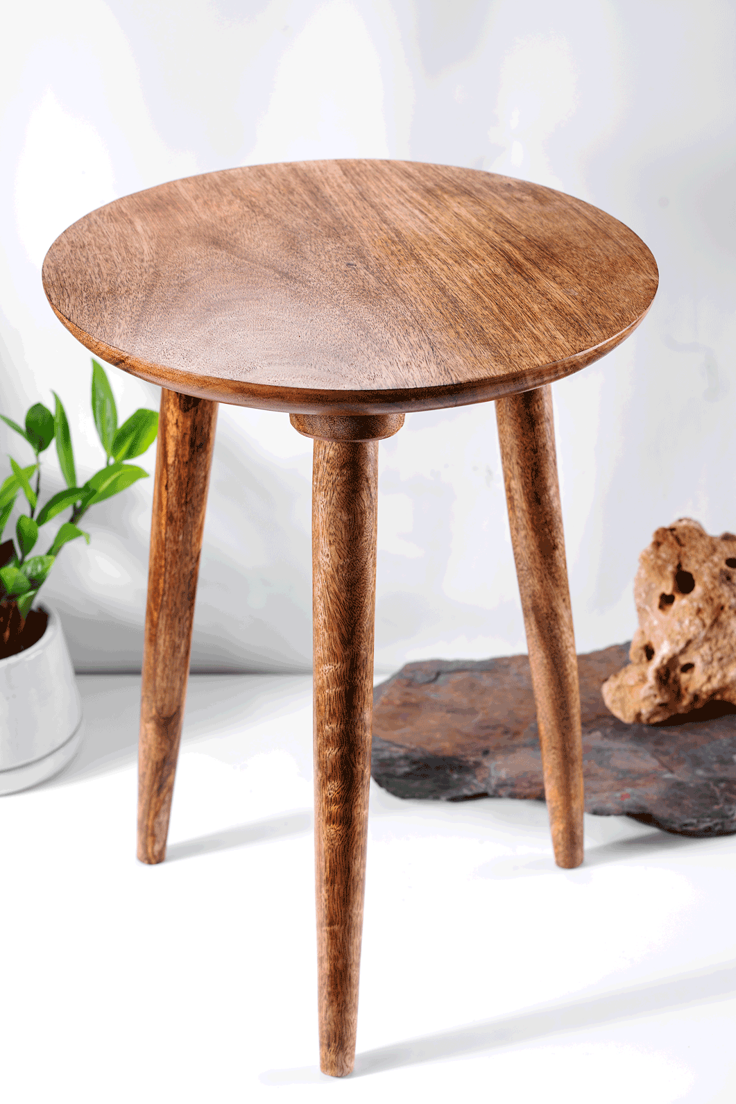 Saral Uttmansh - 3 legged wooden stool, a product by Araana Homes