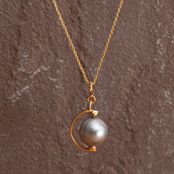 Globe Necklace, a product by The Jewel Closet Store