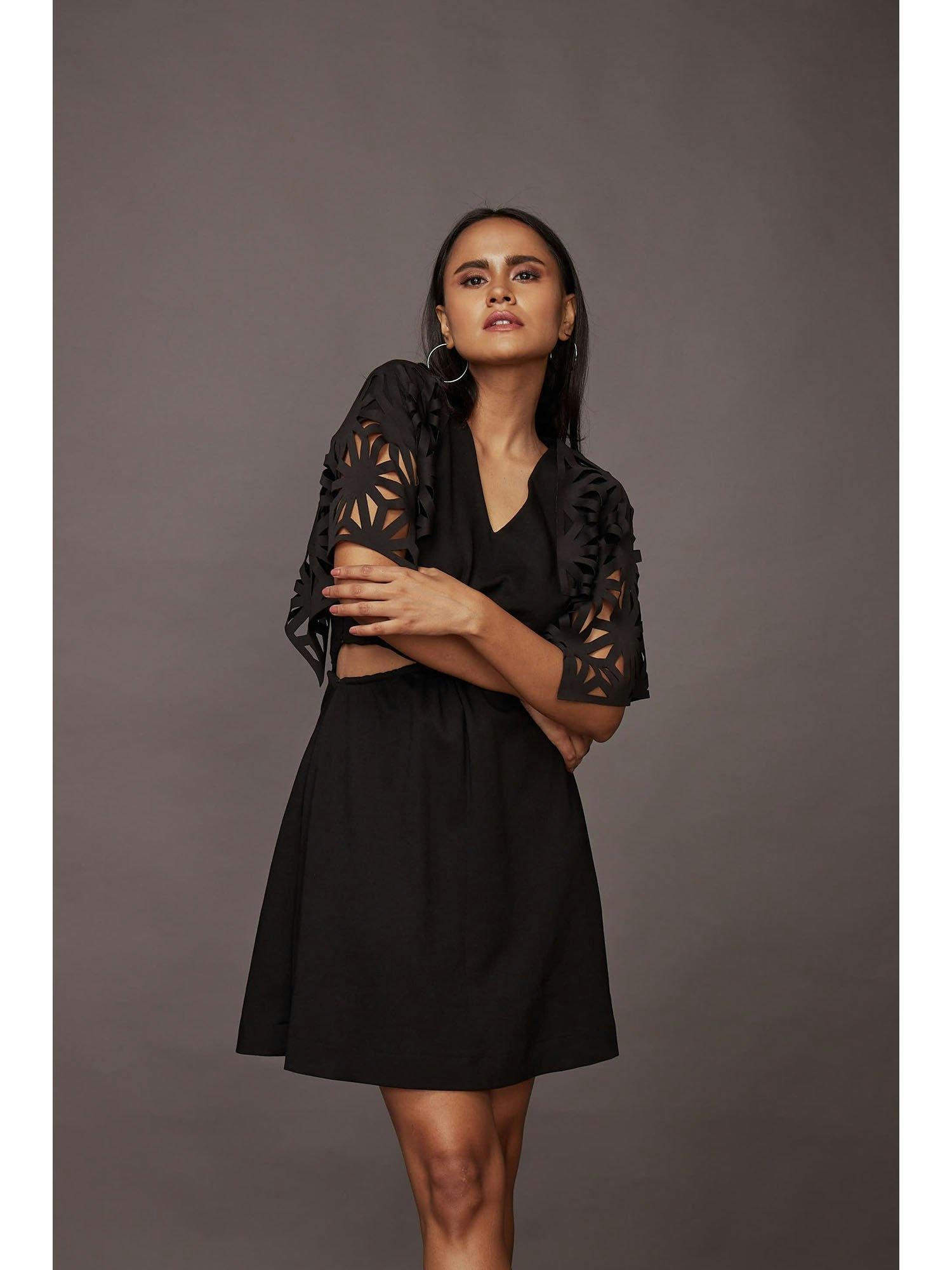 Black cutout dress with cutwork, a product by Deepika Arora