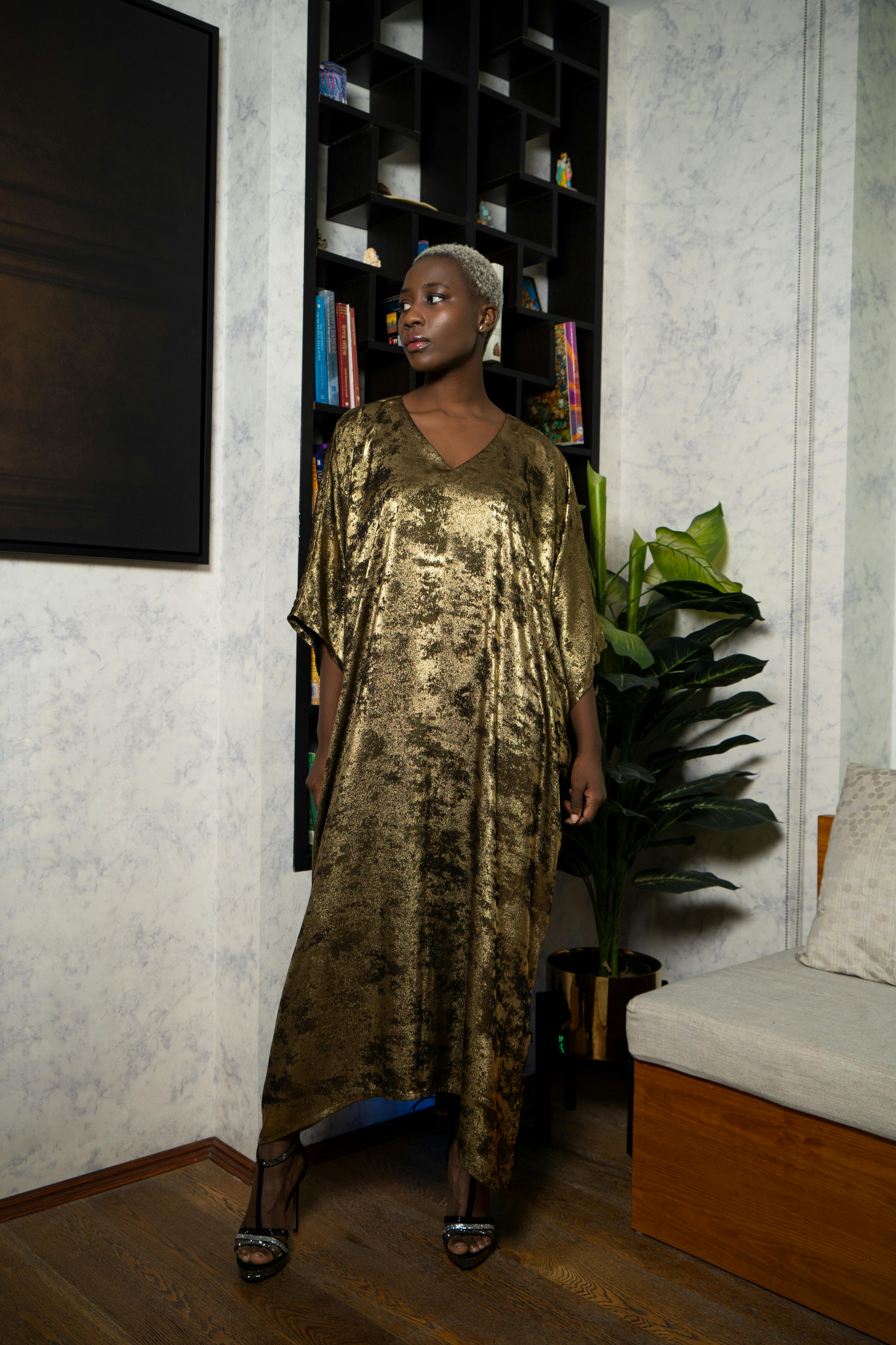Shadow Of Sequin Shimmer Gold Long Kaftan Dress, a product by DHARA SHETH DUBAI