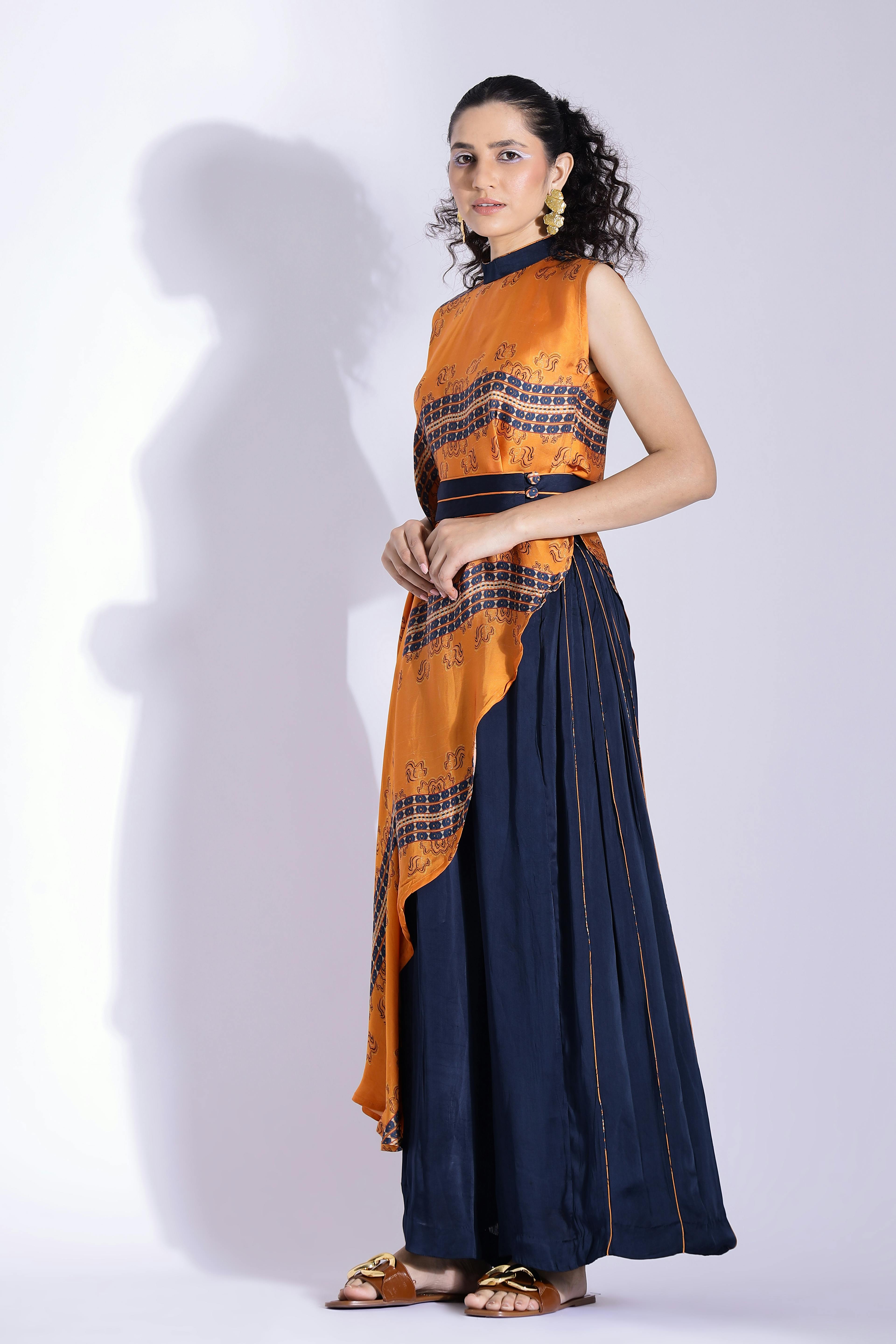Asymmetric top and Side pleated pants , a product by Studio Surbhi
